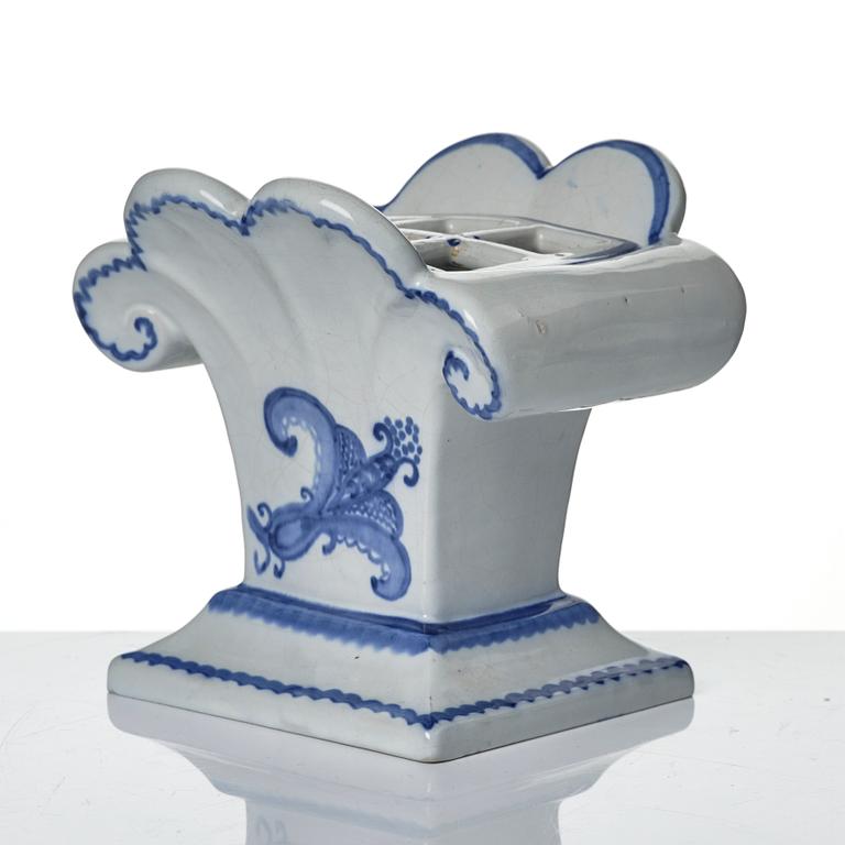 Wilhelm Kåge, eleven pieces of faience including jars, inkwells and a tulip vase, Gustavsberg, Sweden, 1919-1920.