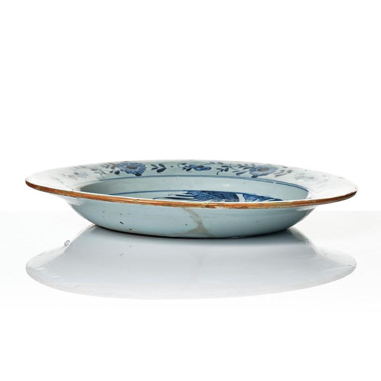 A group of three faience dishes, 18th century.