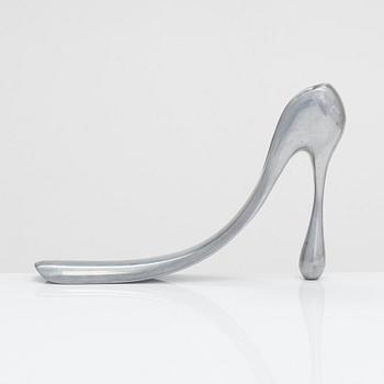 A metal shoe horn by Manolo Blahnik, 2000s.
