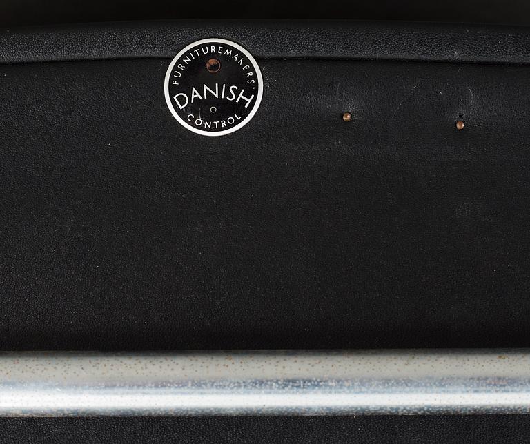 A Hans J Wegner 'Kastrup' steel and black leather chair, AP-stolen, Denmark.