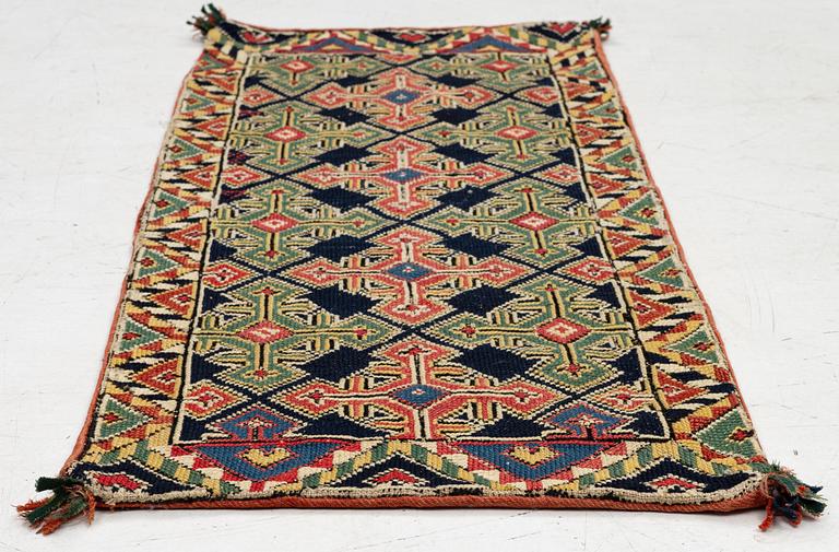 An embroidered carriage cushion, c. 98,5 x 41 cm, South West Scania, circa 1800-1830.