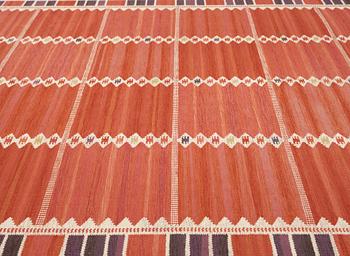 Barbro Nilsson, A CARPET. "Salerno kallröd med enkel bård". Flat weave. 315,5 x 217,5 cm. Signed AB MMF BN.