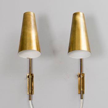 PAAVO TYNELL, A PAIR OF WALL LIGHTS. Stamped Idman. 1950s.