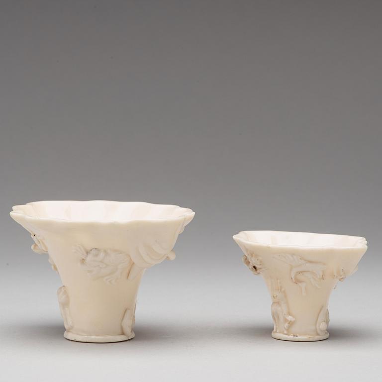 Two blanc de chine rhinoserous libation cups, Qing dynasty, Kangxi (1662-1722).