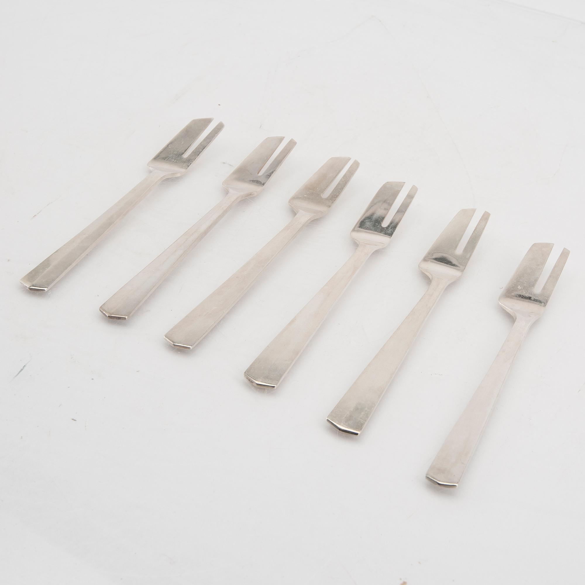 A Swedish 20th century set of 12 silver cake forks mark of Anders Ericson Kristianstad 1969 weight 390 grams.