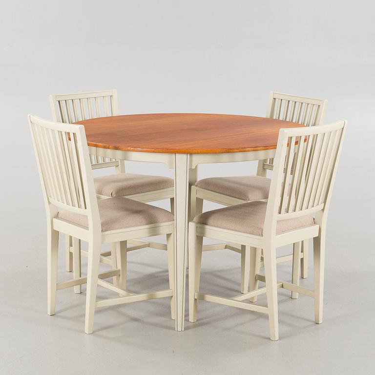 Four chairs and a dining table, probably Karl Andersson & Söner, second half of the 20th century.