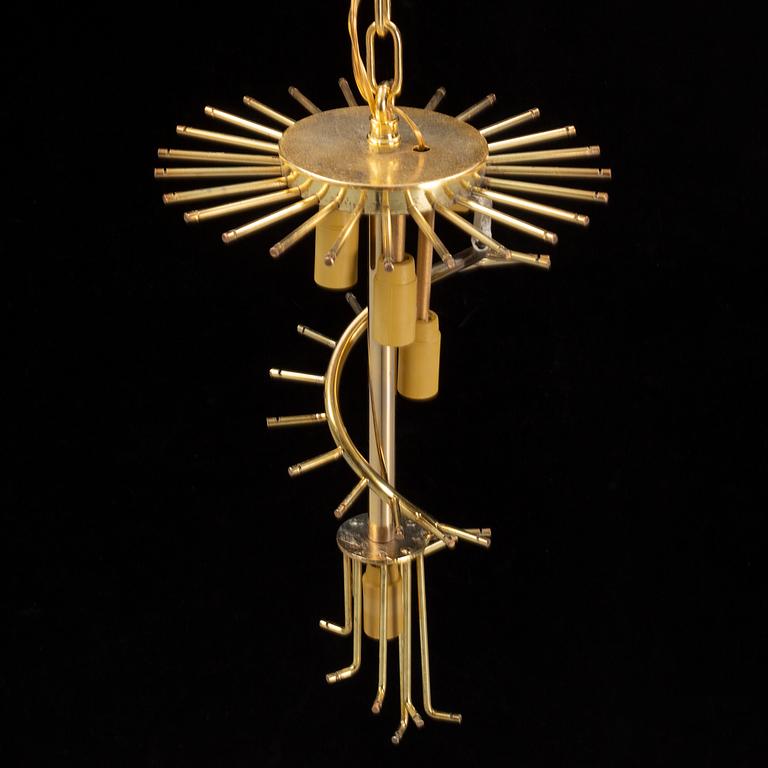 A glass and brass chandelier, Italy, 21st Century.