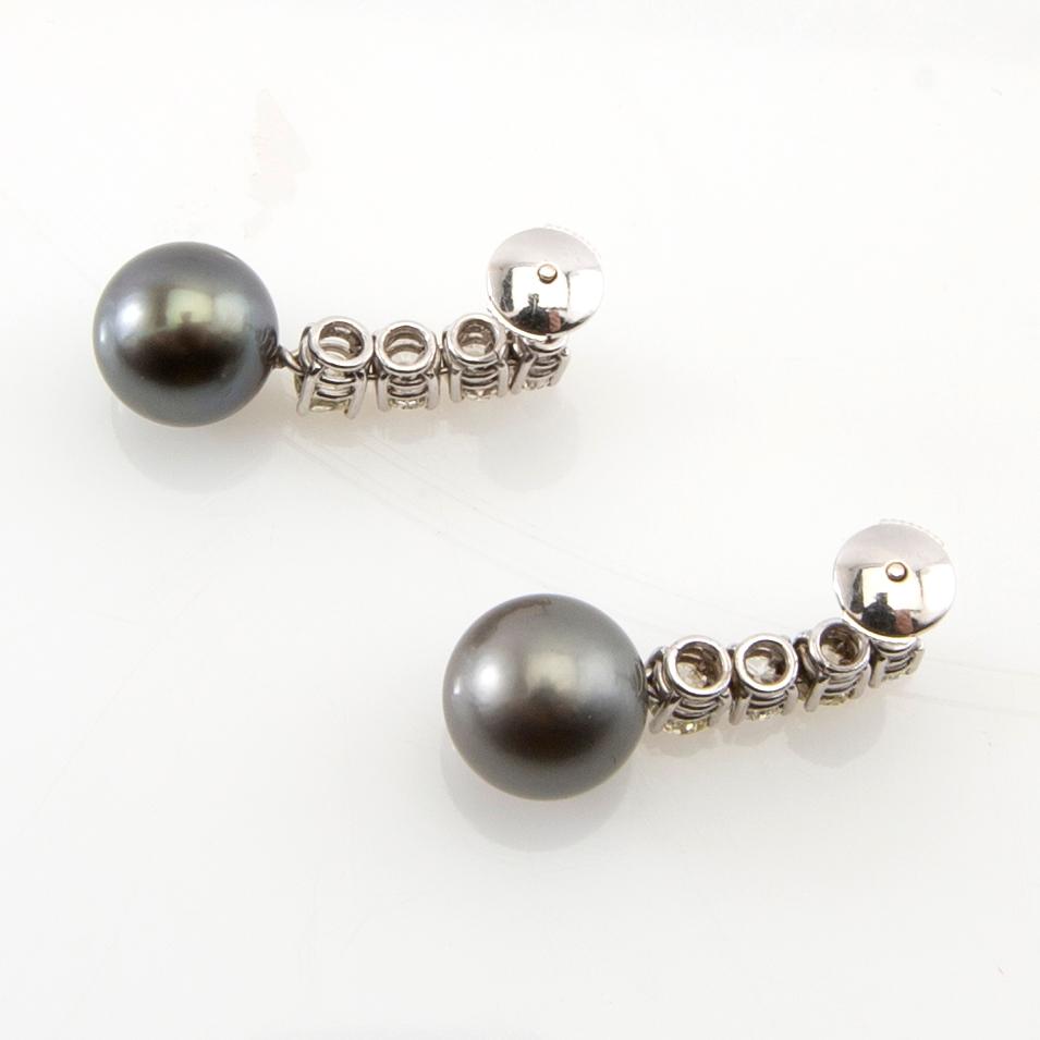 Earrings, a pair of 18K white gold with diamonds and cultured pearls.