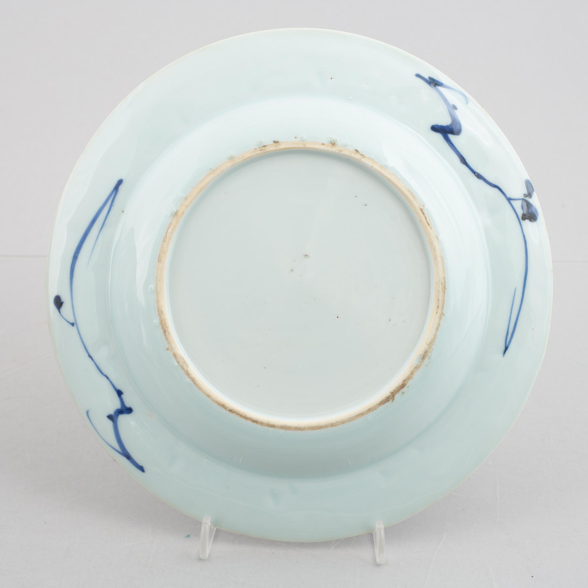 A group of four blue and white dishes and a cabaret piece, Qing dynasty, 18th century.