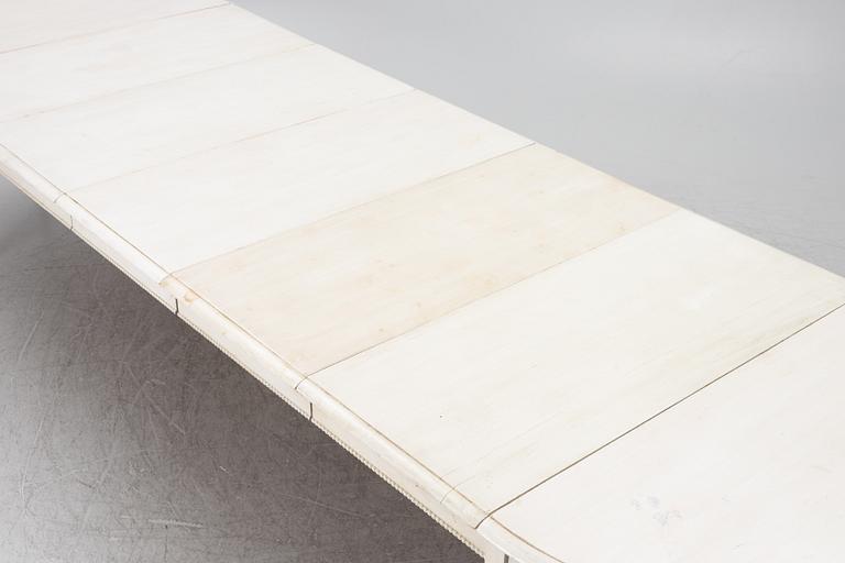 A Gustavian style dining table, late 20th Century.