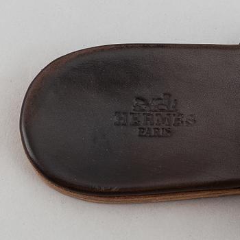 Hermès, a pair of leather sandals, size 39.