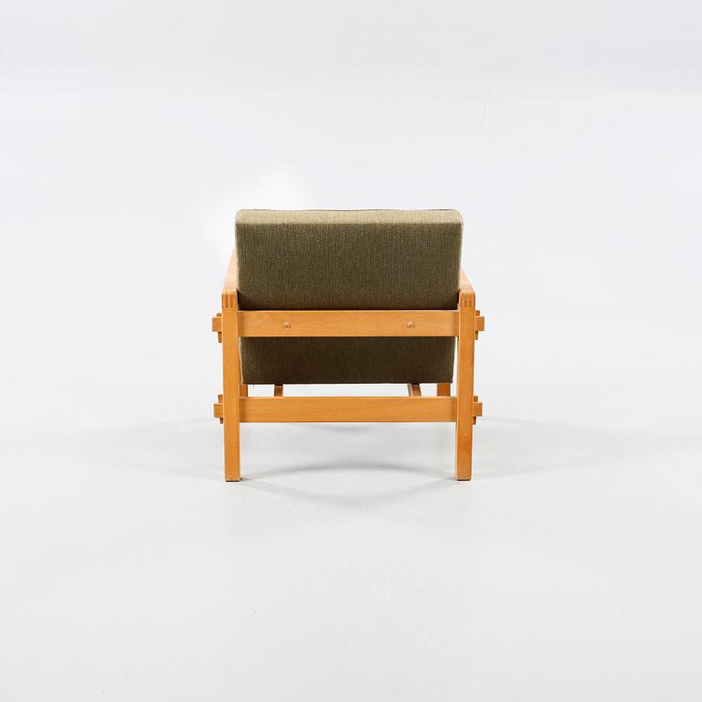 An armchair named "Stugo", designed by Reino Ruokolainen for Futura Möbler AB in Tibro.