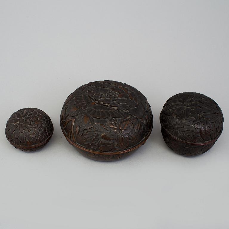Three Japanese wooden boxes with covers, early 20th Century.