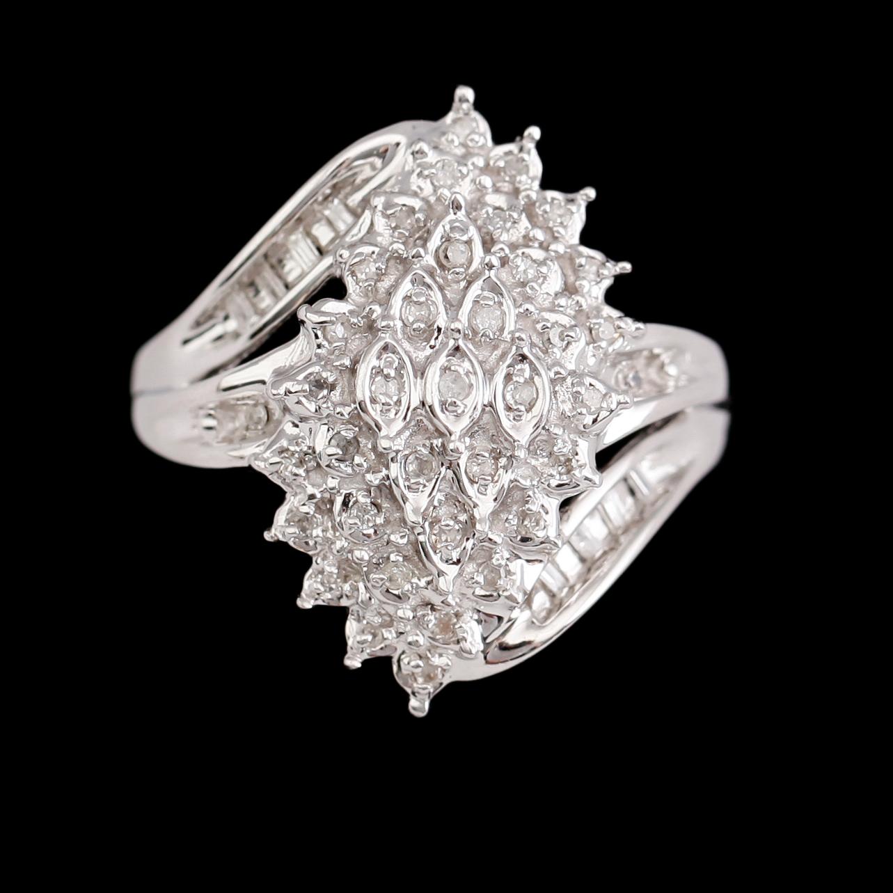 RING, 10 k vitguld, briljant- och baguettslipade diamanter tot 0.25 ct.