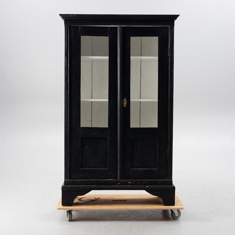 Display cabinet, circa 1900.