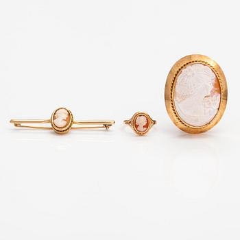 Two brooches and a ring, 14K and 18K gold and sea shell cameos.