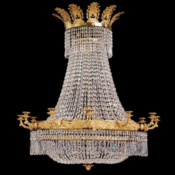 99. An Empire twelve-light chandelier, early 19th century.