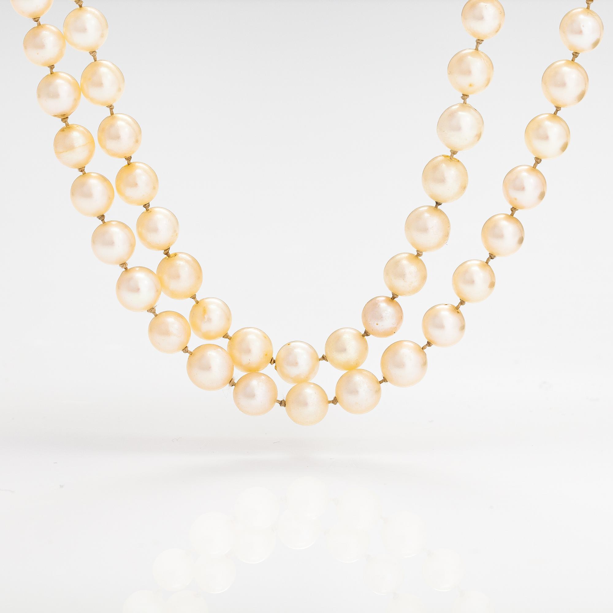 A 2-strand pearl collier with cultured pearls and a 14K white gold clasp.