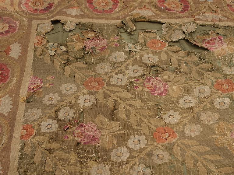 A carpet tapestry weave, ca 561-564,5 x 354-360 cm, Aubusson, France the middle to the end of the 19th century.