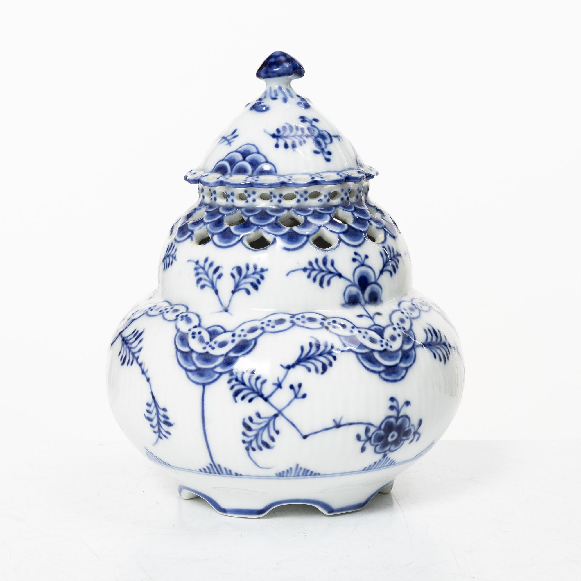 Royal Copenhagen, A 'Blue Fluted' full lace porcelain potpurri urn with cover, model 1/1186, Denmark, 1889-1922.