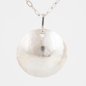 ROSA TAIKON a silver necklace.
