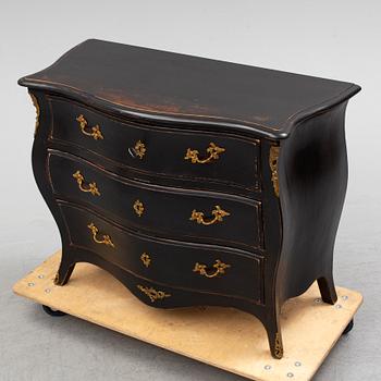 A 1700's rococo chest of drawers.