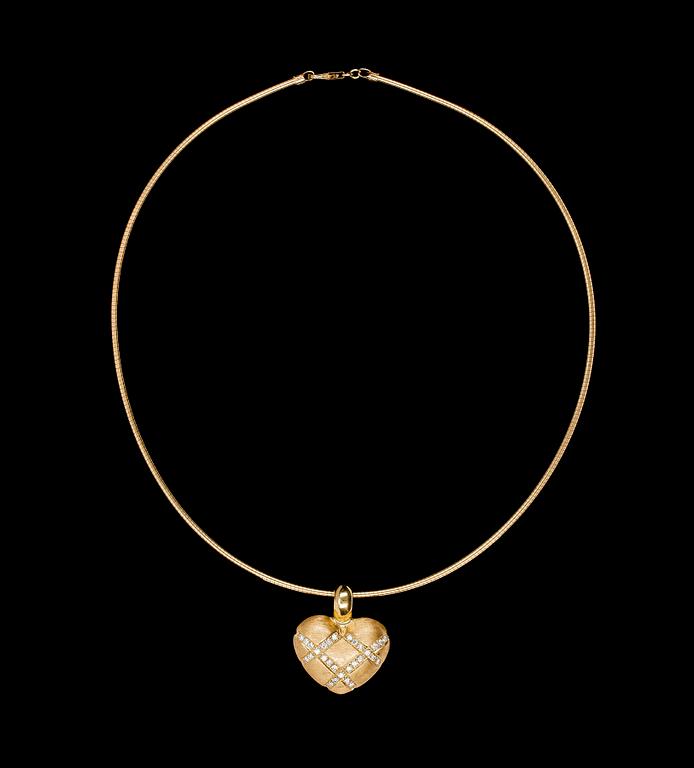 COLLIER, hjärtformat hänge med 29 briljantslipade diamanter, tot. ca 0.60 ct.