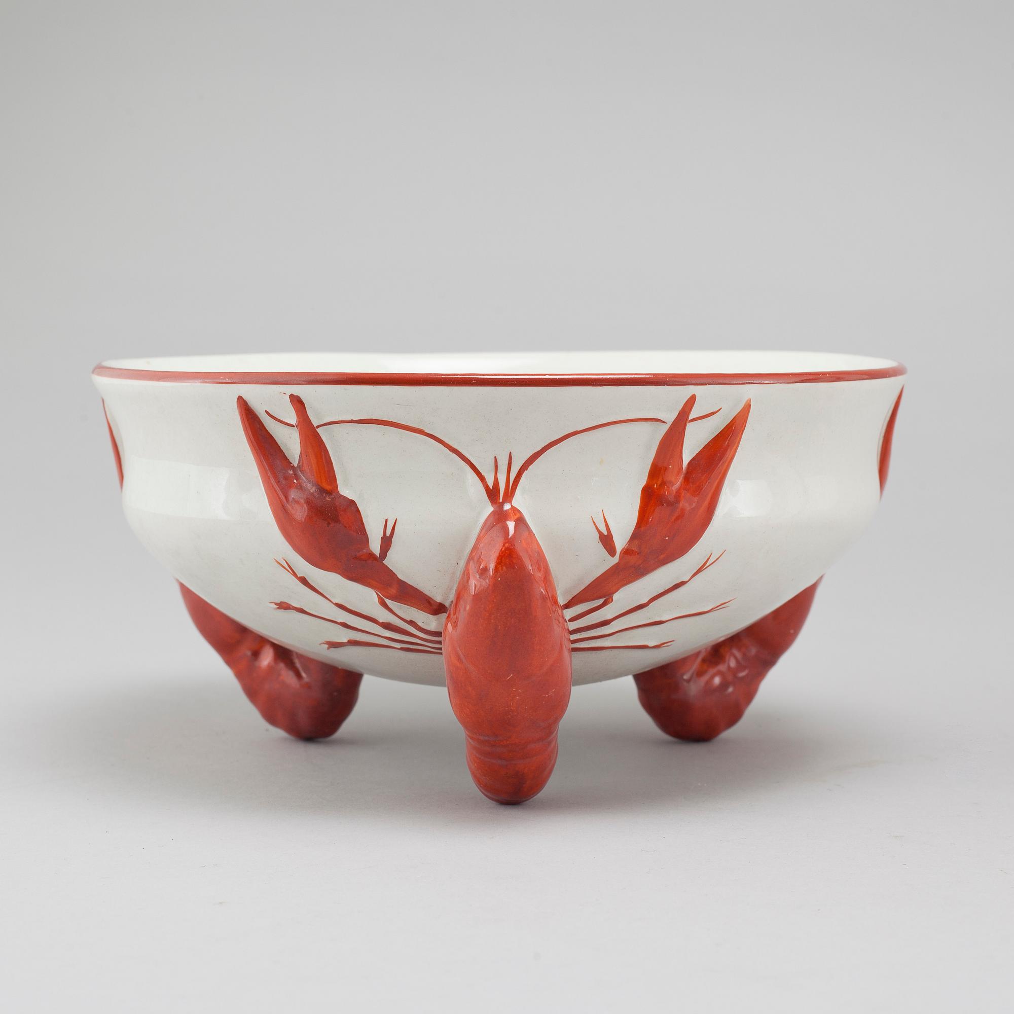 13 pieces of earthenware tableware from Rörstrand, first half of the 20th century.