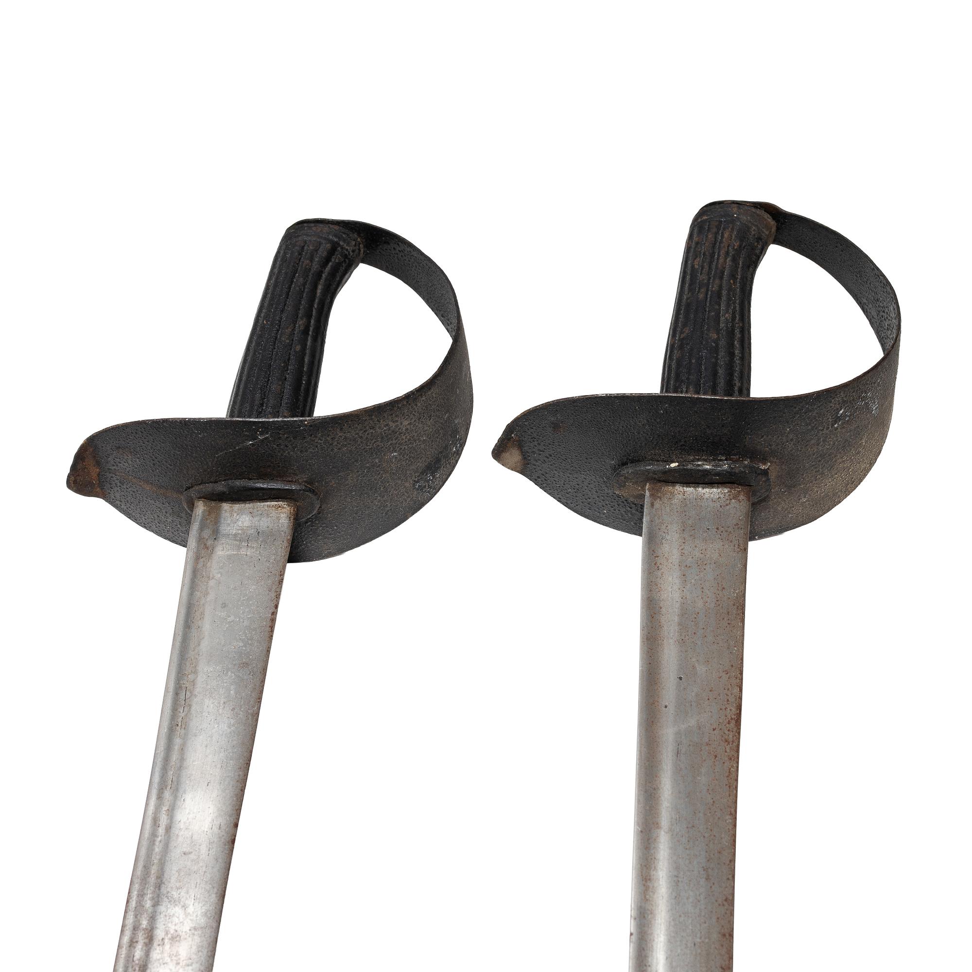 Two 19th century naval cutlasses.