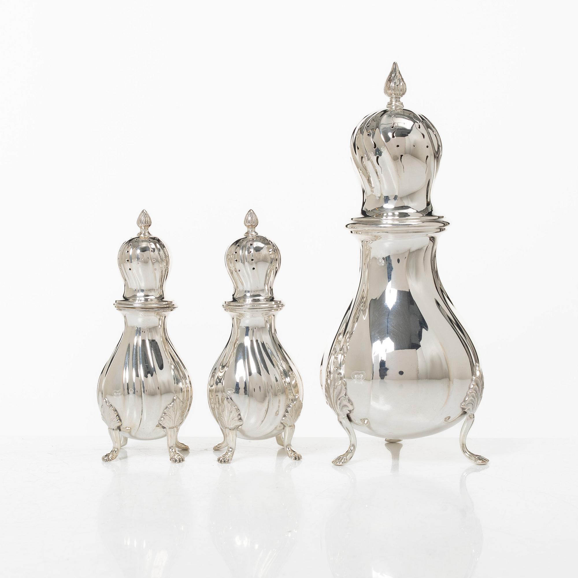 Sugar caster and salt and pepper shakers, silver, marked C.G. Hallberg, including Stockholm 1948.