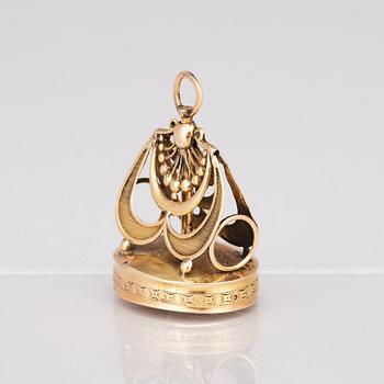A gold musical fob seal. 19th Century.