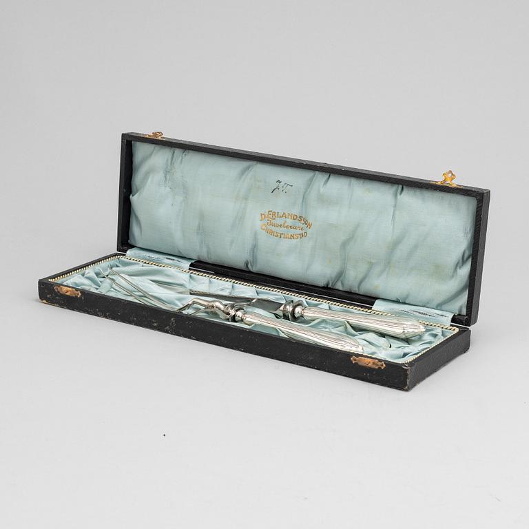 A set of Swedish Art Nouveau carving cutlery, mark of  B Erlandson, Kristianstad 1912.