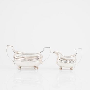 An English silver sugarbowl and a creamer, mark of Charles Fox I, London, England 1813.