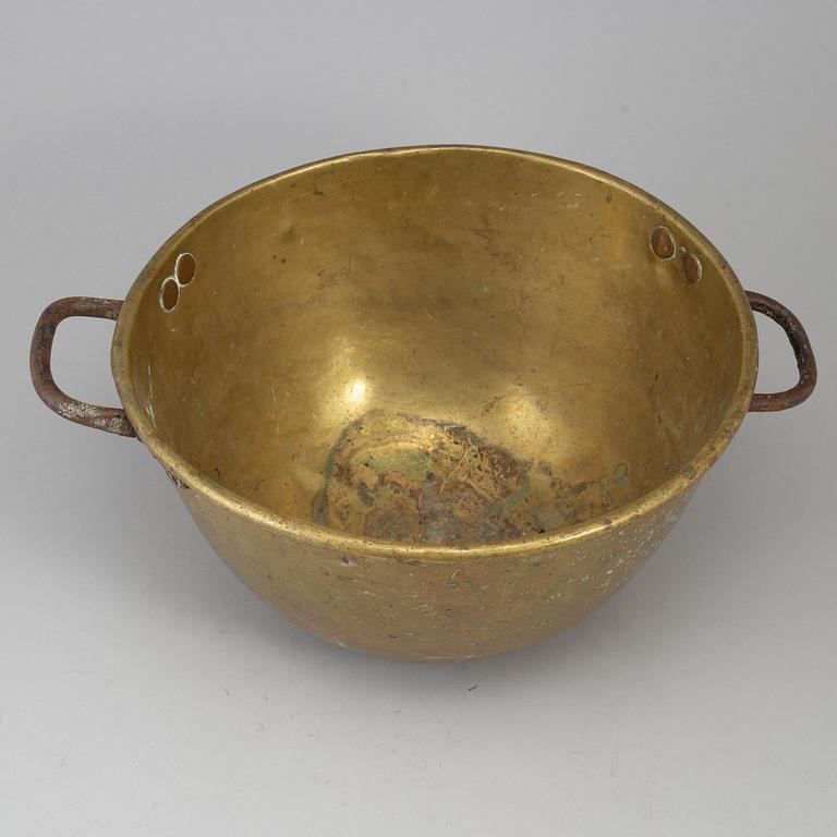 A 19th century brass maslin pan.