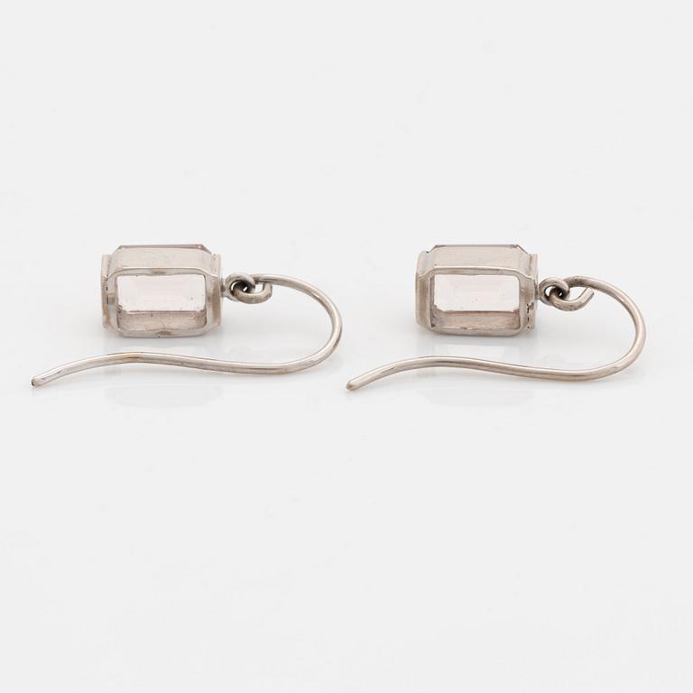 White gold and emerald cut morganite earrings.