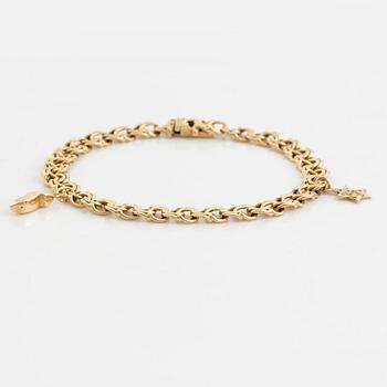 Armband 18K guld, bismarck, med två berlocker 14K guld.
