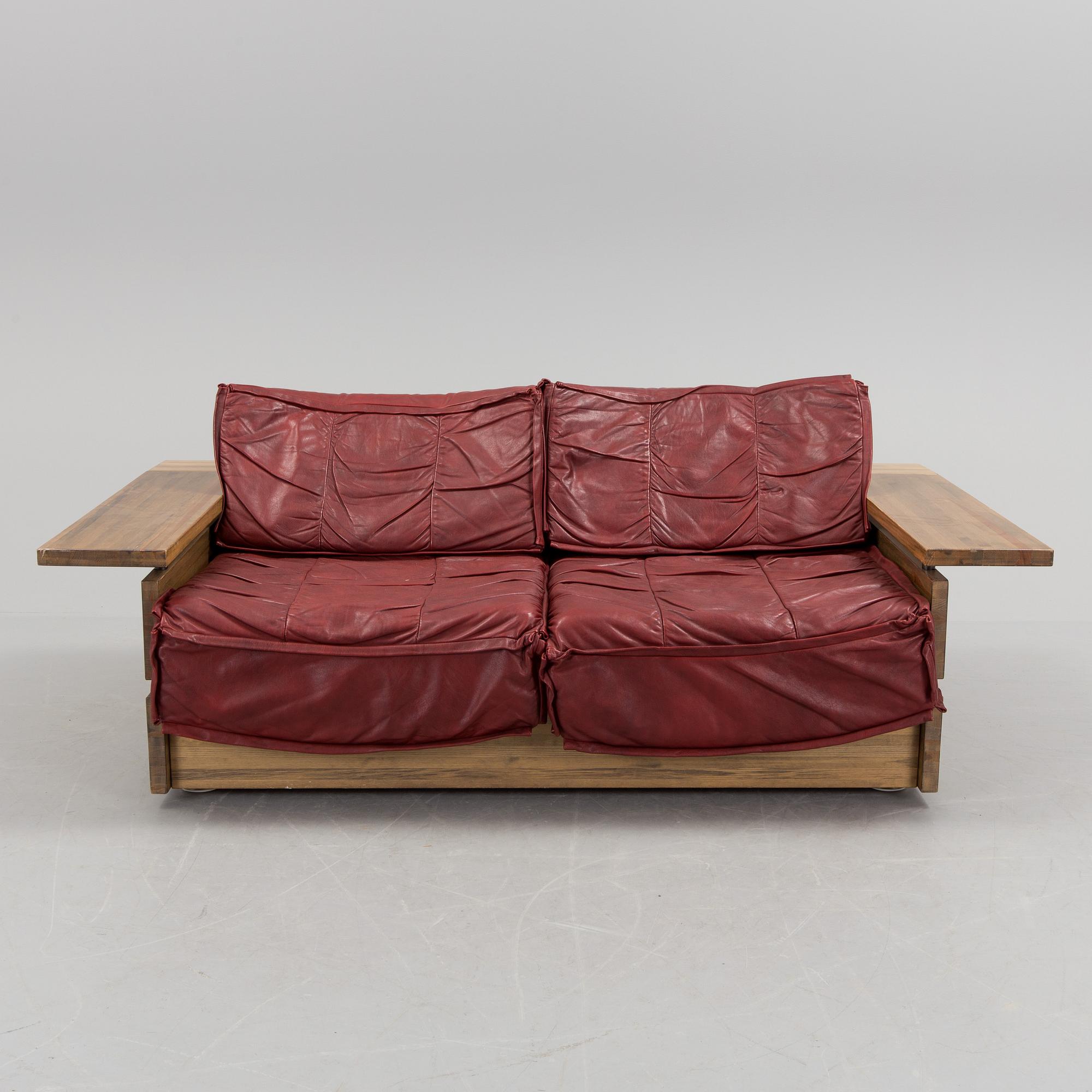 A Hämeen Kalustaja Finnish stained pine sofa, 1970's.