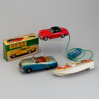 THREE TIN PLATE TOYS, mid 20th century.
