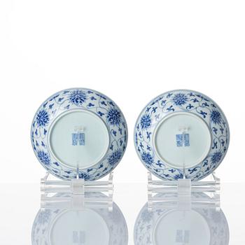 A set of nine blue and white lotus dishes, Qing dynasty with Daoguang seal mark.