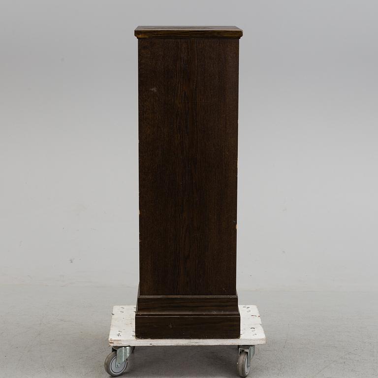 A 20th century pedestal.