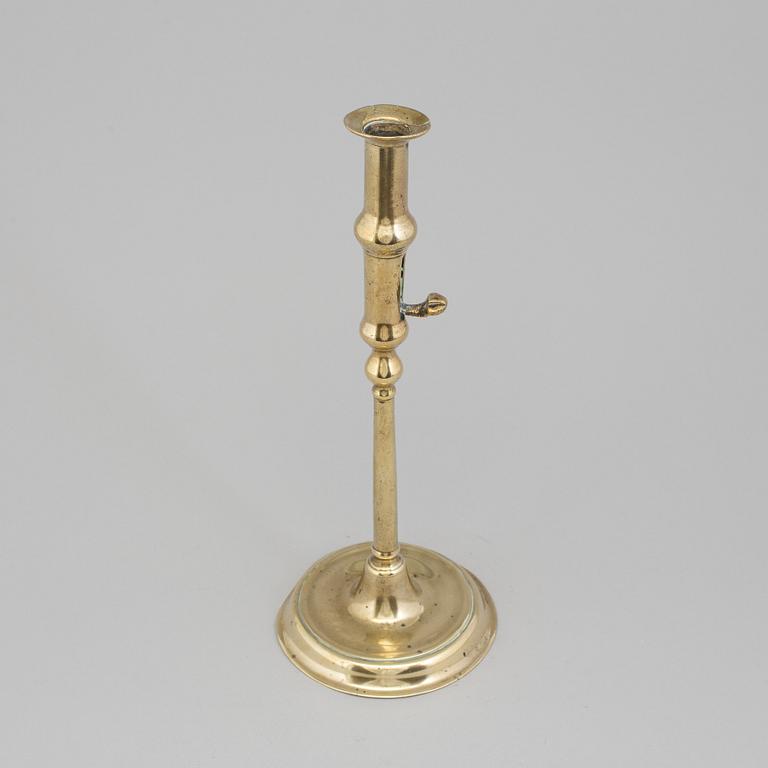 A BRONZE CANDLESTICK, England, 18th century.