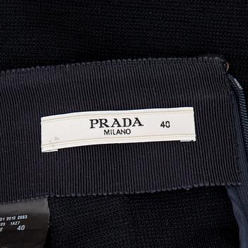 KJOL, Prada.