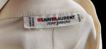 A set of two silk blouses by Yves Saint Laurent.