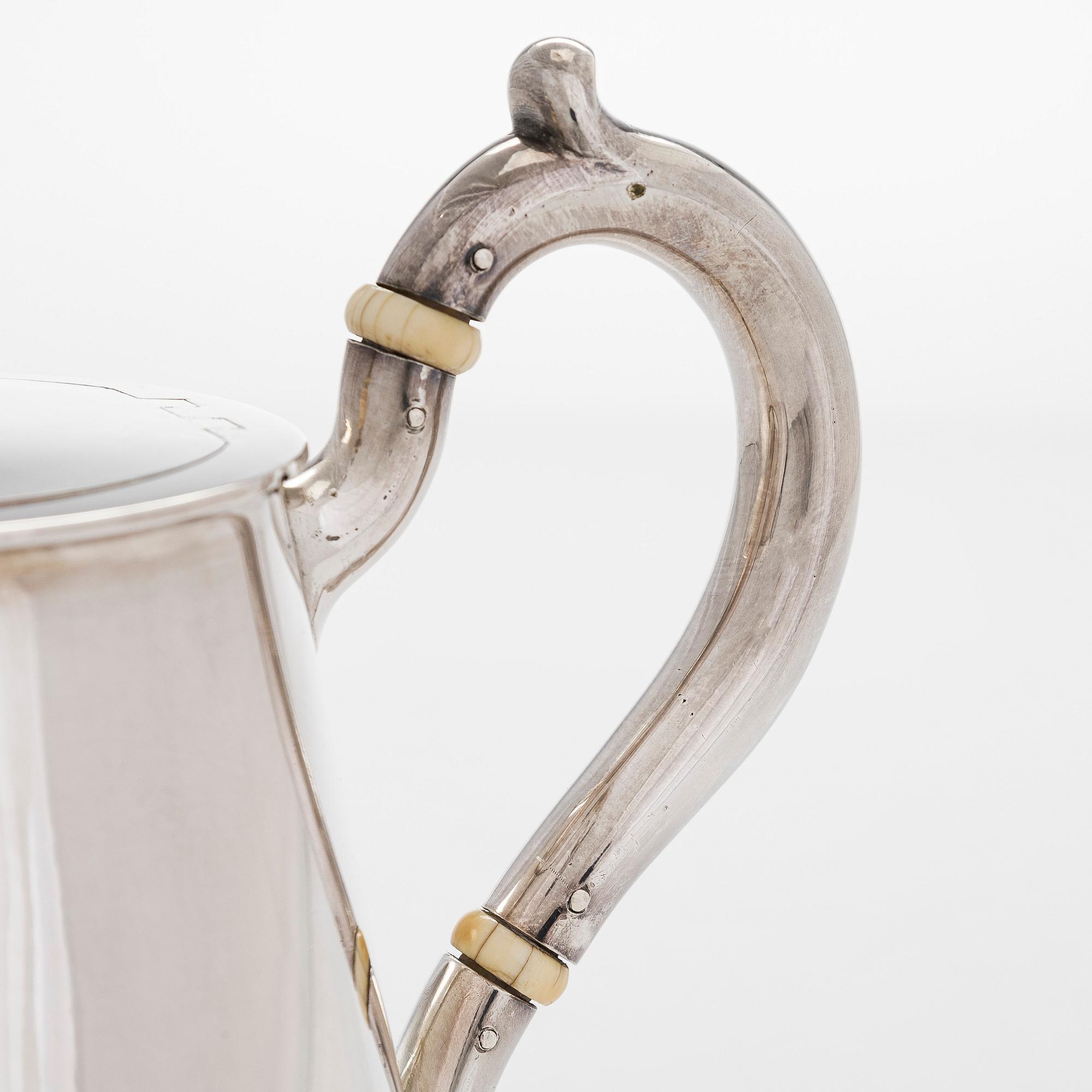 A 19th-century parcel-gilt silver teapot, maker's mark of Johan Heinoin, Saint Petersburg 1878.