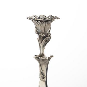 Gustaf Möllenborg, a pair of neo-rococo silver candle sticks, Stockholm, Sweden, 1855.