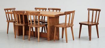 An Axel Einar Hjorth 'Sandhamn' pine dinner table with six chairs 'Utö' by NK, 1930's.