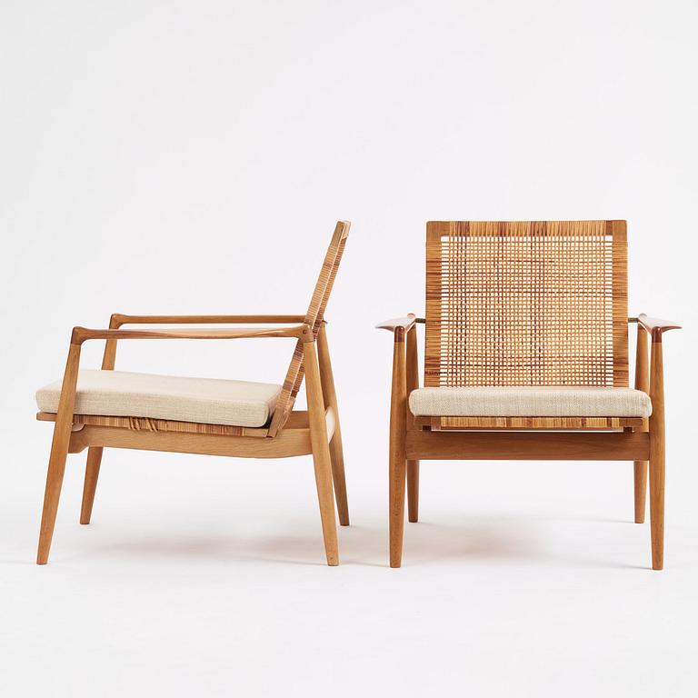 Finn Juhl, a pair of "SW 96" easy chairs, Søren Willadsen, Denmark.
