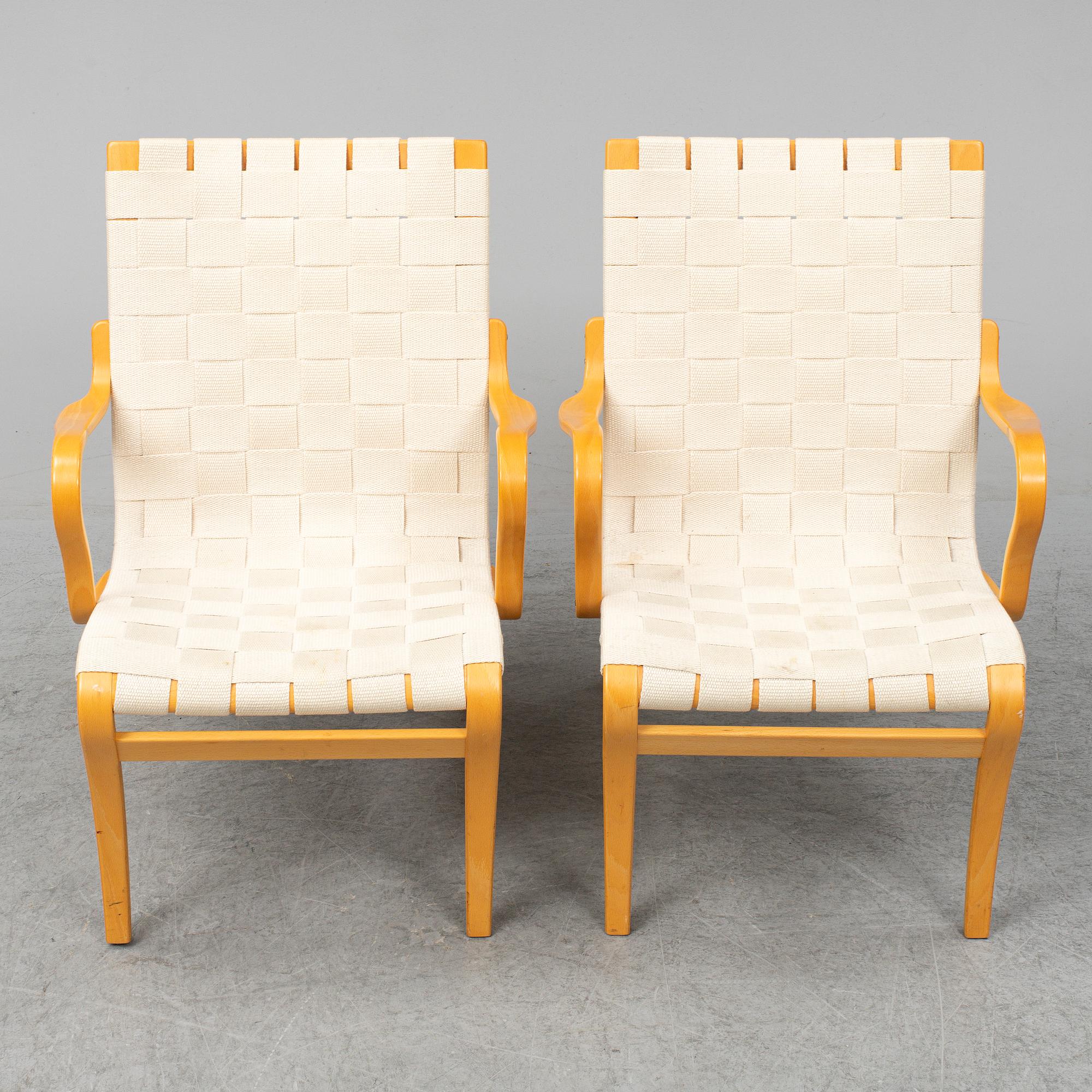 BRUNO MATHSSON, a pair of 'Mina' armchairs from Bruno Mathsson International, Värnamo, 1997.