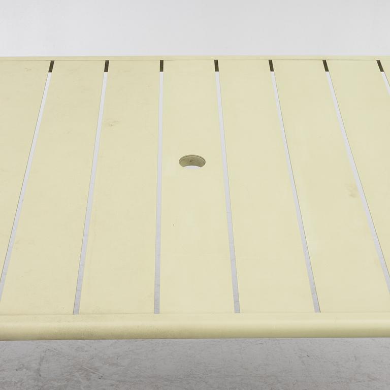 Frédéric Sofia, a table and two chairs for outdoor use, "Luxembourg" Fermob, France, 21st century.