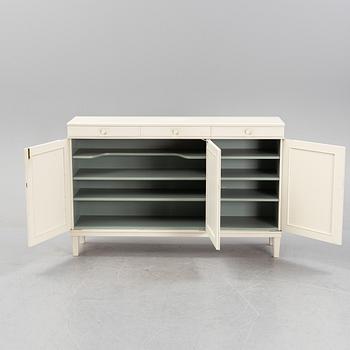 A 'Herrgården' sideboard by Carl Malmsten for Bodafors, dated 1963.